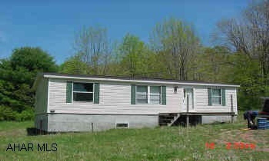 1998 Champion Doublewide w/ full foundation on 1.5 Acres 1998 Champion Doublewide w/ full foundation on 1.5 acresSeller will charge $50 Processing fee to both Listing & Selling Agents.