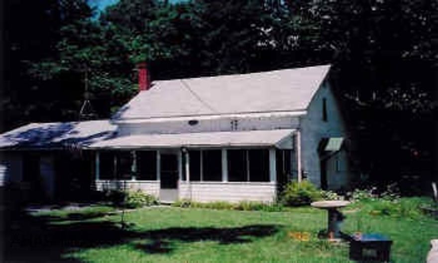 Riverfront cottage. 2 Bedrooms 2 baths, Kitchen, Family room, Dining room,2 Screened Porches, + outbuildings.