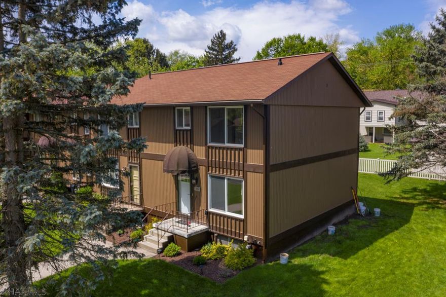 Completely remodeled 3 bedroom, 2 bath end-unit townhouse in the Penn Terrace Development. Freshly painted inside and out with updated fixtures, floors and furnace. Basement can be finished for additional living space. Low maintenance living with no HOA fees. Check out our 3D virtual tour.