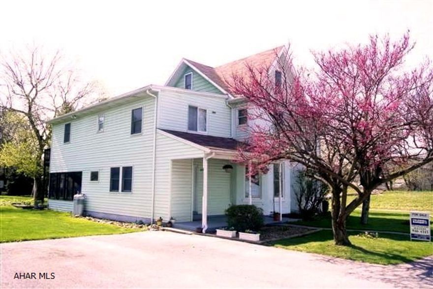 Country feel from farm style home featuring 5 spacious bedrooms, 2 baths. 1st floor laundry. Many modern updates. 2 covered porches, a screened patio, all on a flat .60 of an acre! Wow! Try to buy a home with this much space in Hollidaysburg Schools offering so much.