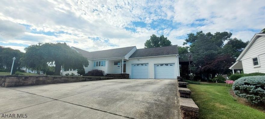 Back on Market at no fault of the home. Large four bedroom four bath home in Spring Cove School District. This he offers three finished floors of living space. The main floor offers a kitchen and dining room. Living room, great room, den/office, 3/4 bath, half bath, and 4 season room with indoor pool. The upstairs offers 2 bedrooms and a half bath. Off one bedroom is a private 2nd floor deck with beautiful views. The finished basement offers a full bath, family room, and kitchenette. The backyard is great for entertaining with a beautifully paved patio, large detached shed, and basketball hoop. There is an alley beyond the backyard for access as well. Come tour this beautiful home in the Roaring Spring Borough. Call today.