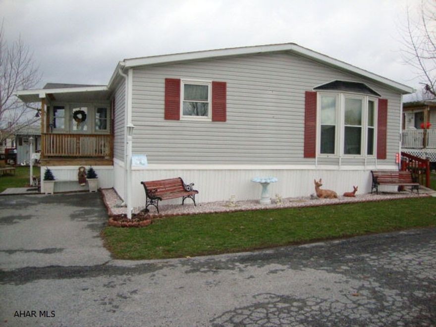 MOTIVATED SELLER WILL LOOK AT ALL OFFERS. MUST SELL QUICKLY!! Beautiful 28 x 80' double wide - Plumbing, hot water heater, water conditioner and C/Air all new within the last 2 yrs. Newer spouting and downspouts, New furnace(2010)  Main living area is drywall, large kitchen with island, five ceiing fans, stone gas fireplace in family room. New walk in shower in master bath and whirlpool tub. Laundry room with half bath. Enclosed Porch and deck with ramp. Well maintained and in good condition. Taxes are in process of being appealed. Contact listing agent for more information. Offer in place contingent on fiancing. Will take back up offers.