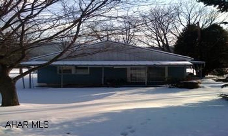 Needs some work, newer windows, .32 acre Freedom Twp (unsure if well is in working condition) 3BR 1.75 BA ranch. Handi accessible