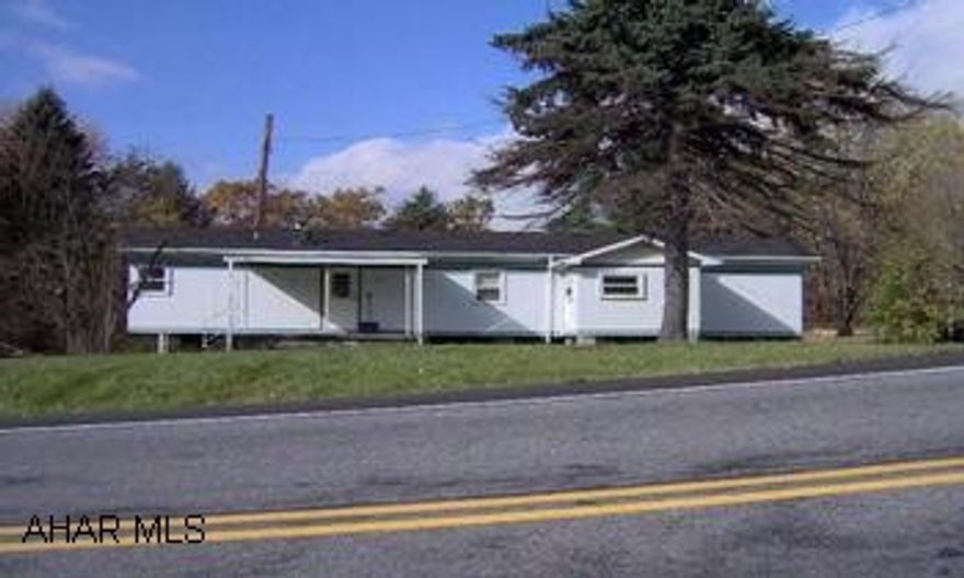 mobile home and garage on almost 2 acres tax ID #'s 06-111-129.3, 43-20-201,205,203,200