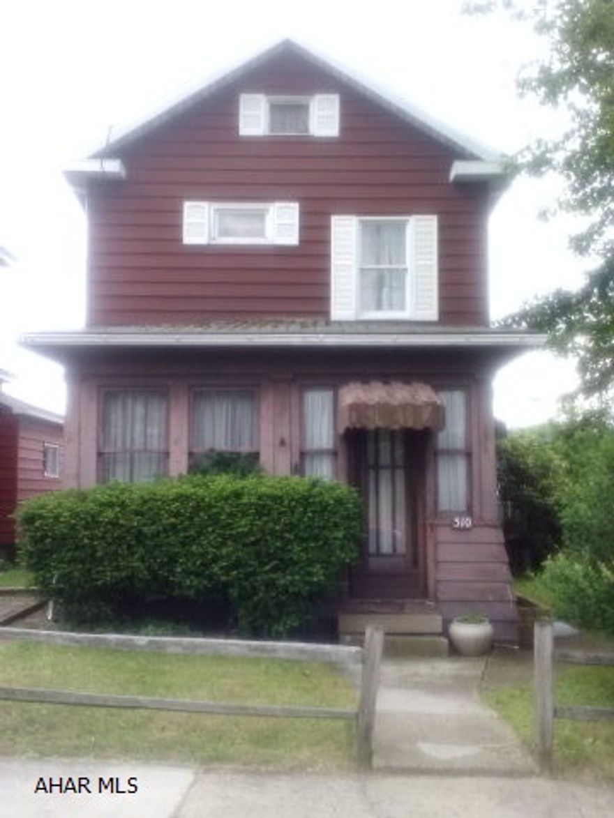 A fixer upper in Gallitzin that could be a nice starter home.  The kitchen is newer with nice cabinets and dishwasher, vinyl floor and pantry.  Big Dining Room. Nice Living Room w/French Doors to the closed-in front porch.  Front porch adds some extra living space to the home. Upstairs has two bedrooms and bath.  The area at the top is open - could be used for 3rd bedroom area if needed or computer/toy area.  Oil hot water heat. Couple newer windows. Very nice yard with a natural fence and shed at the back. Home will need a new roof, foundation repairs and an updated bath.  Really nice location near the playground. An off-street parking space.