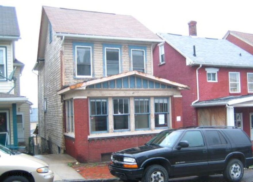 Needs some TLC, but could be perfect for the first time buyer or investor. LR, formal DR, KIT, 3 BR's, plus finished attic & enclosed front porch. Property sold as-is. Seller will make no repairs. Offer must be submitted through HUD approved broker. Buyer pays both transfer taxes.