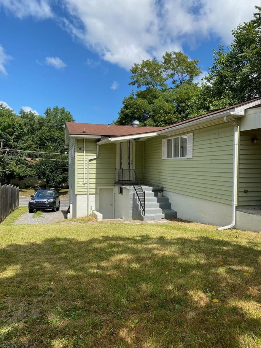 One story living- open floor plan that makes great use of the square footage with vaulted ceilings and modern kitchen, hardwood floors, modern bathroom with tile floor and tub surround, updated wiring, newer heat registers, lighting, new sewer line, 50 gallon hot water tank