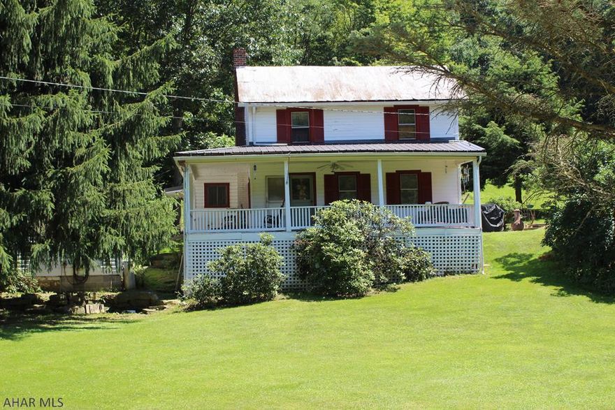 Lovely farm in private area.  This property offers great views, private setting with pond, stream, and great hunting.  The main house has large eat-in kitchen with first floor laundry and bath.  Step out of the kitchen onto the patio for entertaining or eat outside in tranquil setting.  The 1 bedroom guest house would make a great bed and breakfast or rental income.  The property has a septic tank where an old trailer (non livable) is located that would make a great location for an additional dwelling.  50 open acres with 41 wooded acres and 2 acres for homestead.