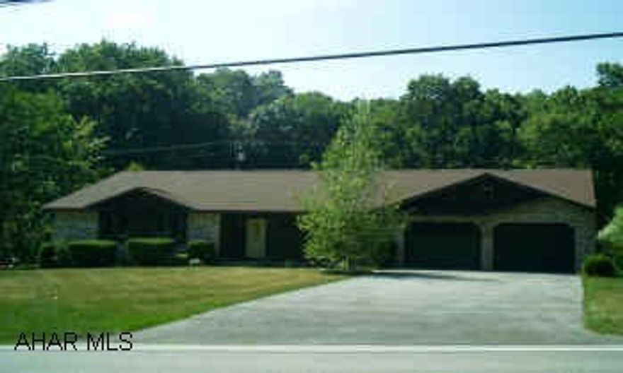 LOWER BRUSH MT RD. BRICK /WOOD RANCHER,3 BD.,4 CAR GARAGE,SUN ROOM,1ST FLOOR LAUNDRY,3.5 BATHS,   LOVELY RANCHER IN HOLLIDAYSBURG AREA WITH MANY EXTRAS....AT TOP OF FRANKSTOWN AT LIGHT TURN DOWN 10TH HOUSE ON THE RIGHT