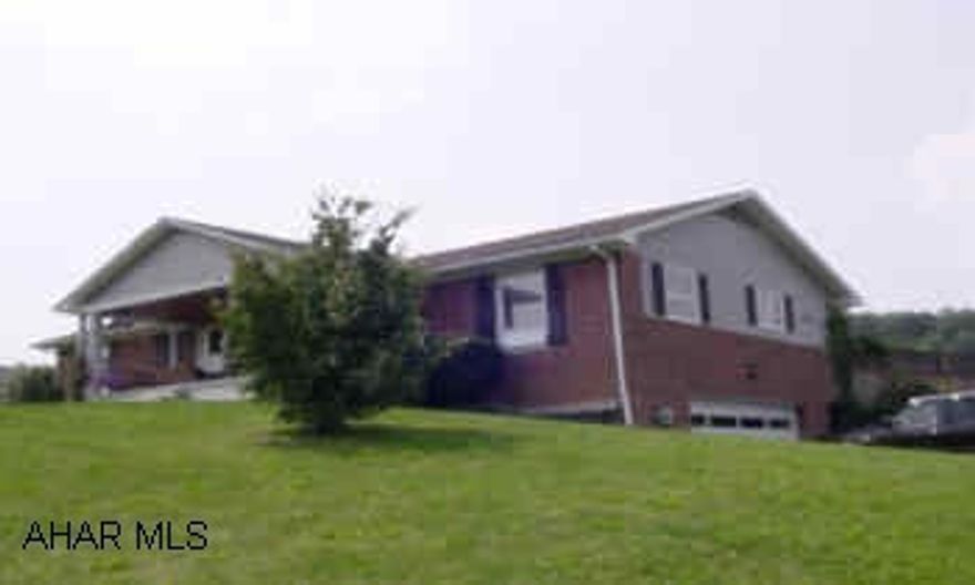 Well Kept brick and vinyl ranch home with open floor plan