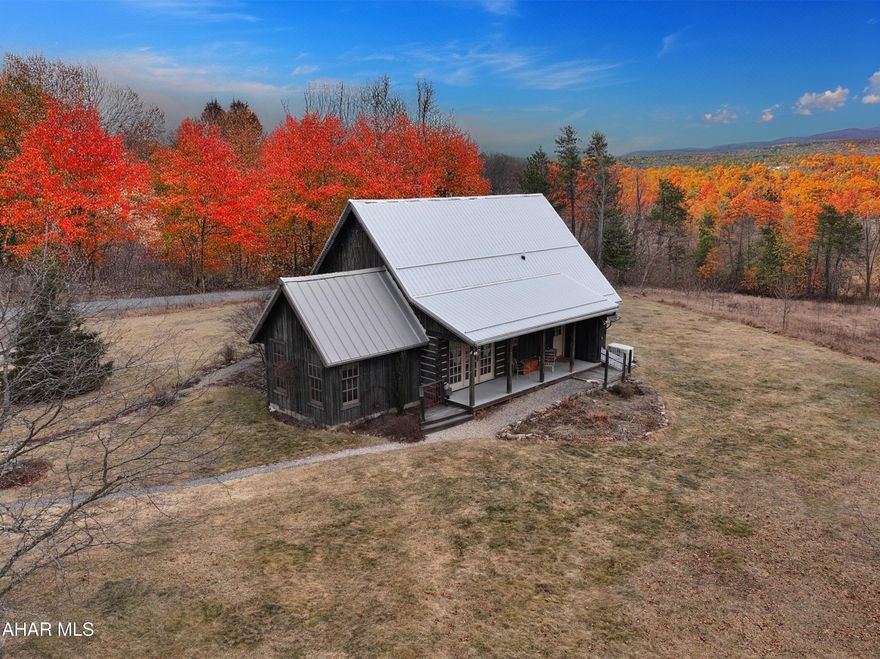 Looking for your own slice of paradise? This elegant home is simply put adorable. A homestead in the middle of the mountains. The craftsmanship of this home is unique and solid. As you pull into the driveway you will immediately be drawn to the quaintness and wholesomeness of this country home. With  several barns and outbuildings, this is the location that you will want to kick back, raise your own food and enjoy the fresh mountain air.  Within driving distance to the cities and major entertainment, yet in the middle of a mecca of outdoor entertainment..