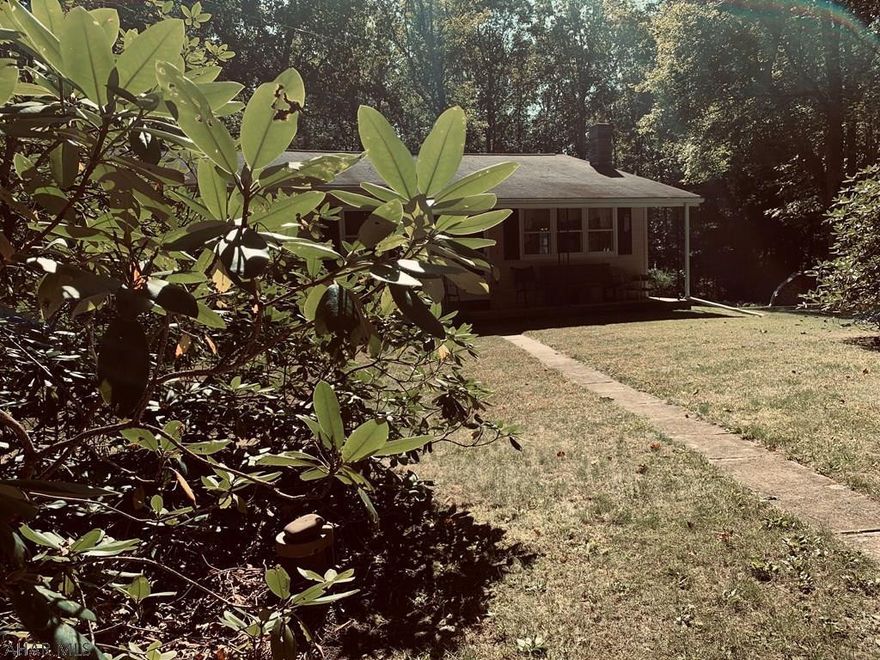 Peaceful and nestled in the woods on 11 acres sits this wonderful one story home.  A lovely walking trail meanders throughout the woods and is enhanced by a stream and multiple ponds.  Huge mature trees grace this setting offering a wonderful oasis for one to enjoy.  Rare find for a great price.