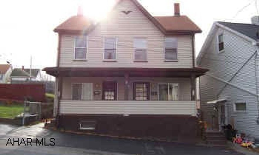 Double house. Sold "as is"  great investment property.  Buyer must pay both (2%) transfer taxes. Call for details. Taxes are for the sum of both units.