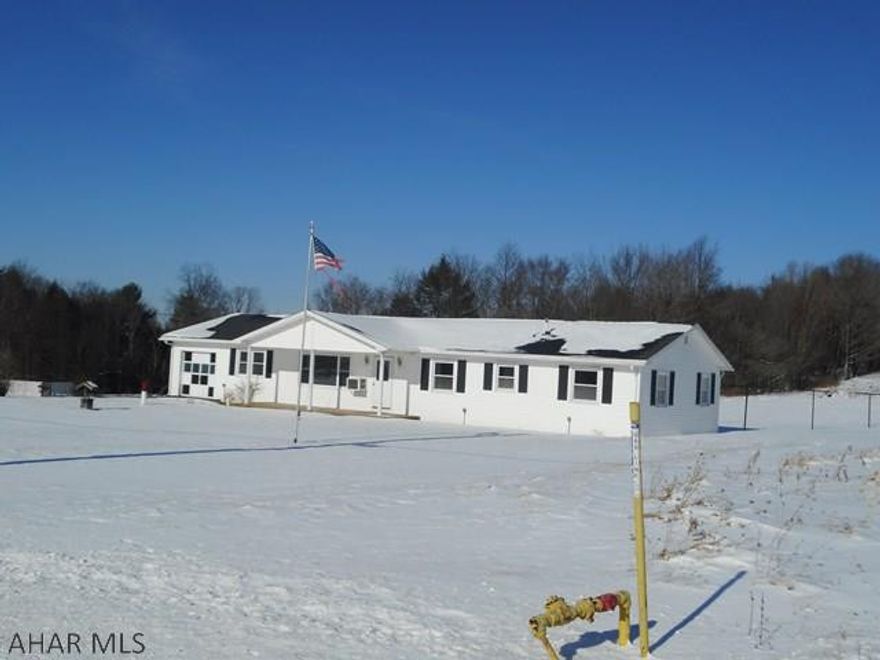Nice country home on almost 5 acres. 3 bedroom ranch with oak kitchen, 1.5 baths and a one car attached and a two car detached garage. Full unfinished basement. Interior recently painted.