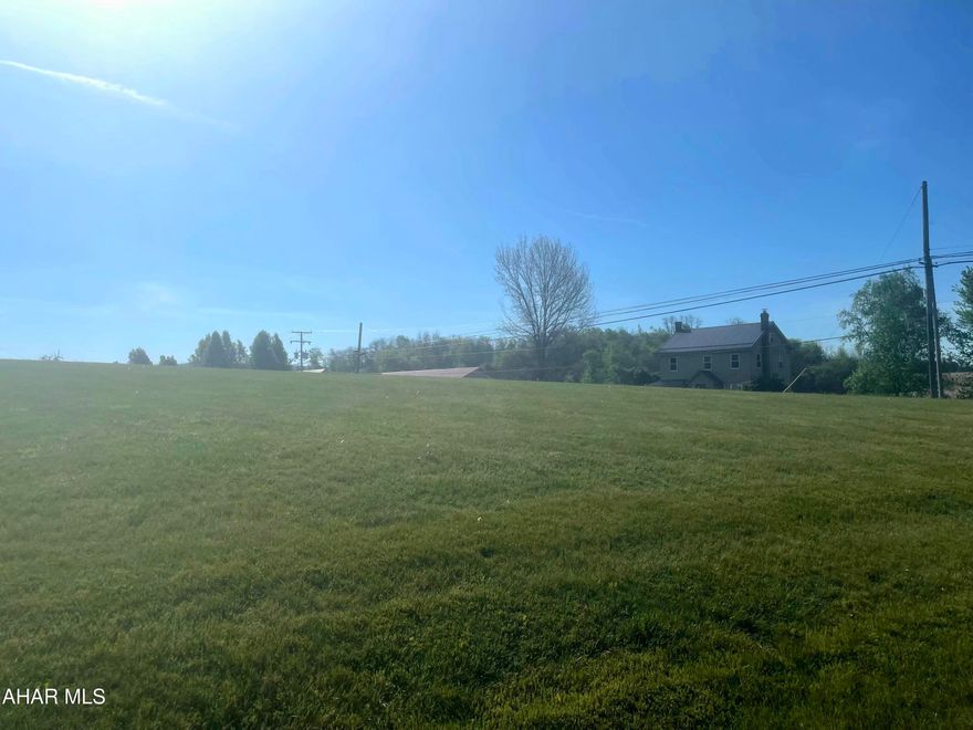 Situated on 2.52 acres this piece of property has endless potential and is waiting for you! Located within walking distance to Morrisons Cove Memorial Park as an added convenience.  

Option to hook on to public water and sewer at buyers expense.