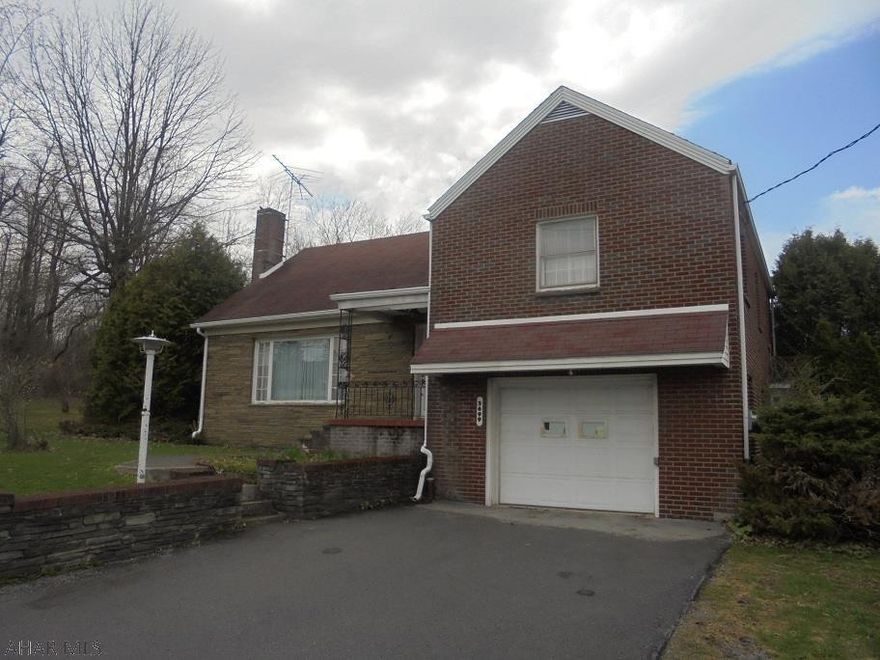 3 BR 1 3/4 bath brick and vinyl sided cape cod. Newer hickory kitchen. 1 car integral garage