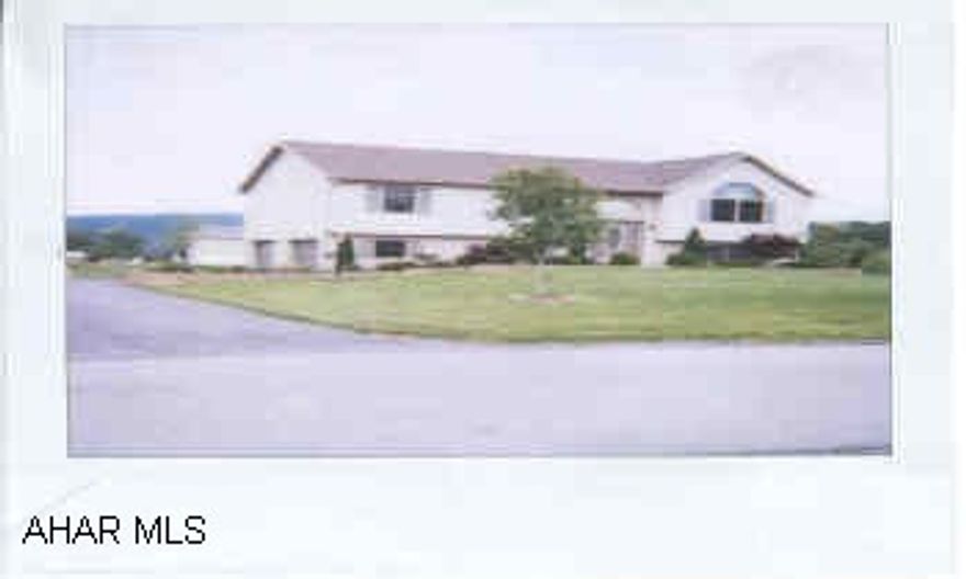 Beautiful Bi-level ready to move in. Family Room with 1/2 bath and FP -  sliding glass door & backyard.Oil Heat -  Owner buys oil in August - Only cost $300 a year!