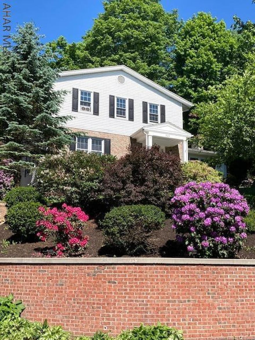 This pre-inspected (report attached) meticulously maintained and updated colonial inspired home in the historic town of Bedford is a must see home. The home's natural flow lends to its entertaining value and the abundance of natural light makes the home feel warm and inviting. Relaxing with friends and family is easy in the lovely family room found off the updated kitchen. French doors from the family room lead to a back terrace and allow exterior and interior spaces to blend seamlessly. If a home office is important the formal living room could easily be converted to accommodate.  The master suite enjoys his and her closets and its own master bathroom. Two additional bedrooms share another separate bathroom. The double car garage adds to the home's appeal.