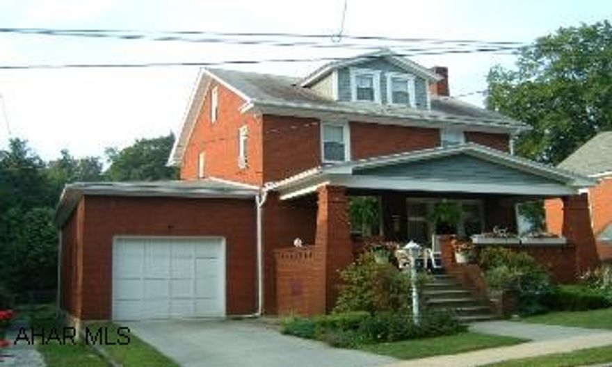 2 story Brick home with 3 or 4 bedrooms, 2 full baths.  Laundry in basement.  1 car attached garage with fenced in yard.  Close to everything downtown.  Great neighborhood.  Many updates including wiring, plumbing, and replacement windows. Solid 2 story brick home in the Hollidaysburg Boro.  1st. floor with living room, dining room, kitchen, full bath and den or 4th bedroom.  2nd floor with 3 bedrooms and 1full bath.  Great front porch and back porch, also 1 car attached garage.  Fenced in yard.  Many updates including kitchen and bathrooms.  Close to schools, stores, library  and YMCA.