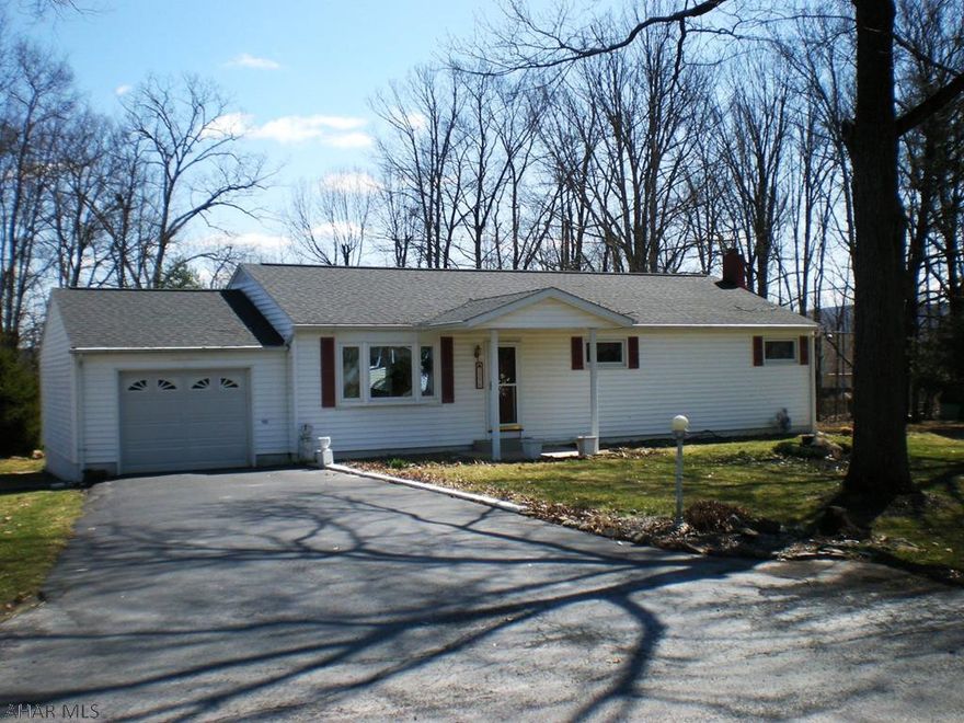Fantastic 1 Story Ranch with 3 Bed Rooms, 2 Baths, and a 1 Car Integral Garage on a level 150'x174' lot in a great location off of Brush Mountain Road (Frankstown Twp).  Outstanding features include but are not limited to hard wood floors, beautiful built in wood cabinets, updated Kitchen, All Season Sun Room with a view of and walk out to the heated in-ground swimming pool and large back yard. Basement is partially finished and has lots space for additional  storage and a work area.