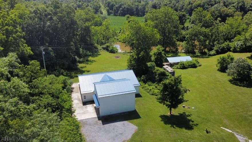 Life is fine with this hard to fine newer home which has a huge amount of River frontage , situated on a great section of the River. Has a covered pavilion for lots of water fun and picnics. Home was built in 2012. Must take a tour to truly appreciate. Does need flooring in several rooms. All the rooms are very light ,airy and spacious. Attached garage with 2nd floor separate living area that needs finished, third bathroom, all of it has beautiful pine walls and ceiling. Large Detached garage /workshop/parking for extra vehicles and storage. Sits on 10.599 acres of privacy... All this yet just seconds from Rt. 30 and all Area Amenities.