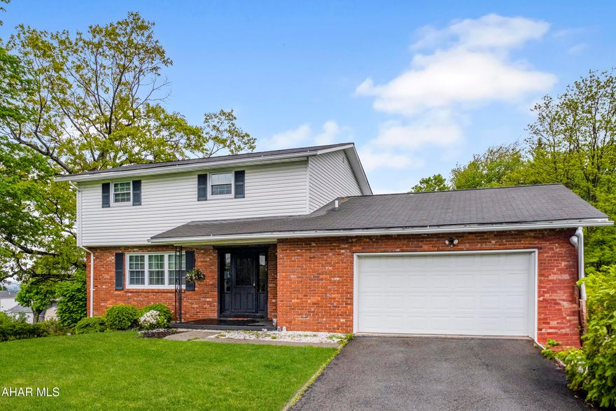 Beautifully maintained 5-bedroom, 4-bath home located in Cresson Borough. This spacious property features a newly renovated kitchen with solid surface countertops, tile backsplash, and stainless steel appliances. With two master suite - one conveniently located on the main level - plus two living rooms, a formal dining room, and three additional generously sized bedrooms upstairs, there's room for everyone. First-floor laundry and new laminate flooring on the main level add comfort and convenience. The attached garage offers easy access and additional storage, while the expansive basement provides plenty of space for storage, recreation, or a workshop. This home is move-in ready with new HVAC and has been meticulously cared for - check out our Matterport 3D virtual tour and schedule your showing today!