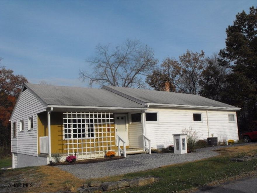 This home was built by the owner. Construction on the house began in the early sixties and was a labor of love as the owners perfected their home over the next decade. It has a beautiful additional built-on room on the side of the home that was used as a dining room, but could be anything you desire. It has lots of outlets and a laminate floor.This property is within 40 minutes of Altoona, Johnstown or Cumberland, but has the peace and quiet you see from living in the country.The mailing address is Schellsburg, but is actually just outside of Fishertown.There is a detached garage/ workshop with a cement floor that is 16'X24' with a subpanel from the house. Plenty of room for a garden and family play space. Come look at this one in this desirable area of Spring Hope. Central air