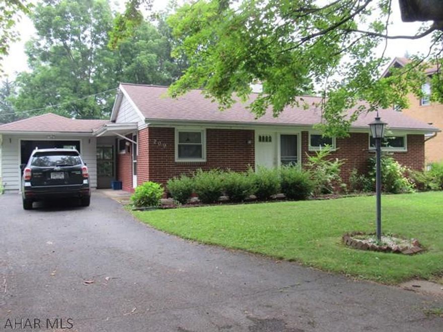 This well maintained brick ranch home is situated on a tree lined street and  is within close proximity to Historic Hollidaysburg, schools and shopping. The home has newer windows, and is larger inside than it appears. There is a screened in porch that overlooks a flat yard.