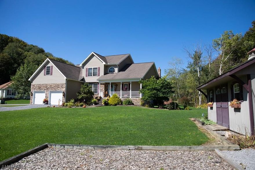 One of the areas nicest homes is now available!  Beautiful two story stone and vinyl sided home on just over an acre. This home features 1st floor master bedroom with bath and walk in closet, equipped cherry kitchen with tile floor, open dining room and breakfast nook, laundry room, living room with vaulted ceiling and oak flooring, and a half bath. The second floor has 3 bedrooms and a bath along with an open loft area overlooking the living room. Full basement with superior walls, oil hw heat and an electric heat pump/air conditioning. Great home for the $$.