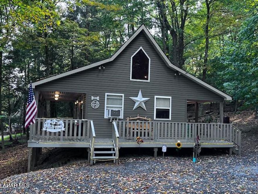 Are you looking to get away and enjoy nature?  Either permanently or as a weekend warrior? ... This cabin in Glendale Yearound may be the place for you.  No need to do a thing but relax around the campfire after a day on the water which is literally right outside the gated entrance of this vacation oasis.  HOA amenities include a  Swimming Pool, Tennis Courts, 2 Playgrounds, Gate Access, Road maintenance, and more.  Upgraded plumbing, driveway improvements, Washer/Dryer stay, Beautifully maintained.