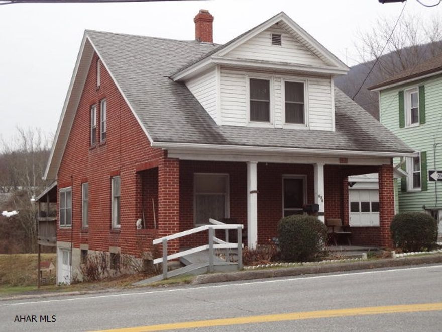 Well maintained brick cape cod. All natural trim still remains in kitchen. Newer covered deck added in 2007 gives great views and easy access to Juniata River