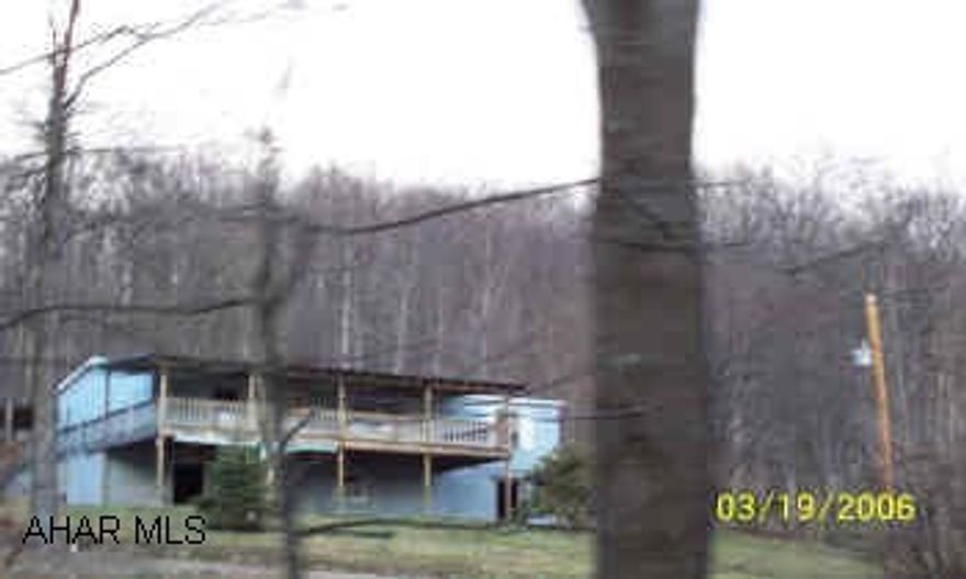 Doublewide on foundation.   Comm split 50-50. Needs TLC. Sold AS IS. See Listing Agent for addemdums. Submit offers online at www.selectreo.net. Seller is offering a $500.00 commission bonus for a contract that funds on or before 5/19/06.