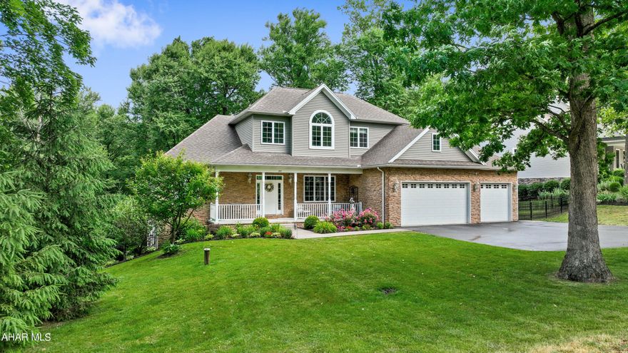 Remarkably well-maintained, custom built home located in Juniata Mills Development! Main level of this beautiful home offers a 2-story foyer w/ c. tile; great room w/ cathedral ceiling & floor to ceiling stone fireplace; kitchen w/ maple cabinets, granite counters, island, & eat-in area; formal dining room w/ crown molding; master bedroom w/ tray ceiling, ensuite bath w/ tile shower, jet tub & walk-in closet; laundry w/ tile floor; & 1/2 bath. 2nd level has three bedrooms and full bath. Basement w/ large rec room; 1/2 bath; walk-out to ground level patio; and storage areas. Covered front porch, rear deck, finished 3-car attached garage with heat and central air, & black top driveway. 200-ampere electric, heat pump system w/ central air, well, & public sewer. Quality features throughout including maple & c. tile floors, & granite counters. This is an outstanding home that is absolutely move-in ready!