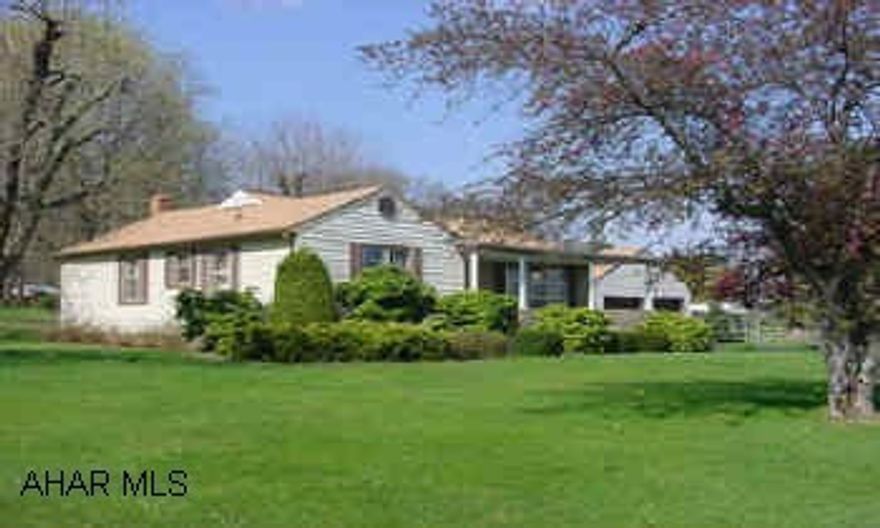 3 Bedroom 1 Bath rancher with 2 car garage on 1 acre lot. Well maintained 3 bedroom, 1 bath Rancher on one acre in Spring Cove. Hard wood floors, 2 car garage, oil hot water heat.