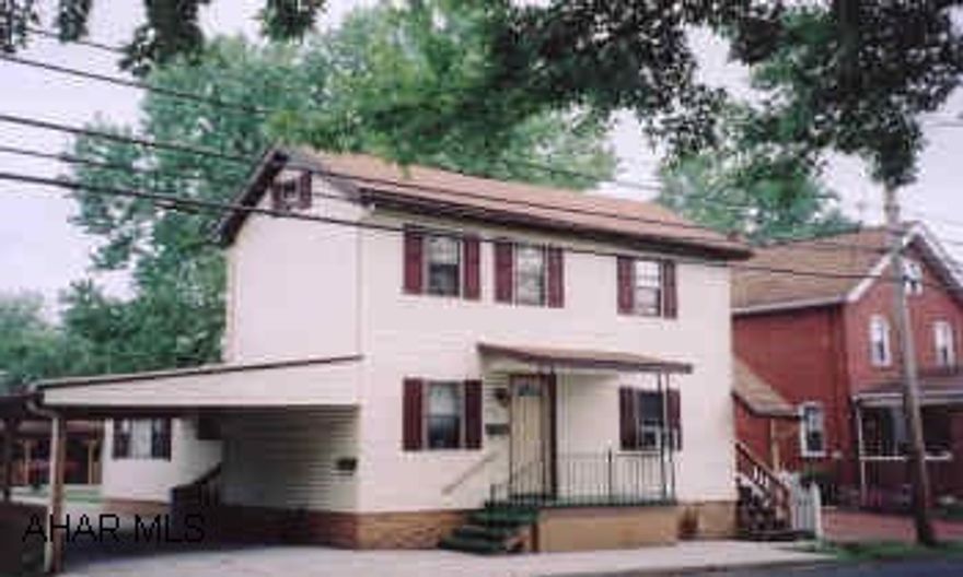 1-car detached garage.  TWO 1-car carpots.