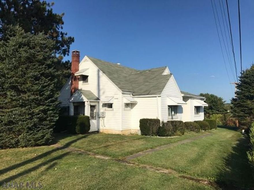 Nearly 30 acres of peaceful, country heaven. Property has a large spring fed pond that is absolutely beautiful. 3 bedroom, 1 bath cozy, cape cod with detached 3 bay garage and workshop. Original hardwoods. Heat pump with forced air oil backup. Central air. City sewer with private well and currently using Spring. Black top circular drive that leads to your forever home. Make this one your own!