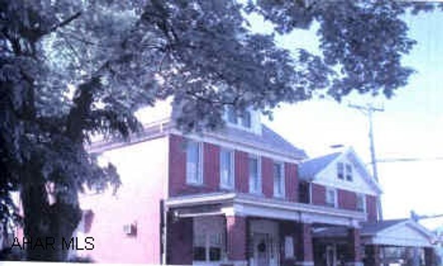 Brick duplex with 2 car detached garage. 2 Unit brick with 2 car detached garage on double lot.  Additional off street parking.  100% occupancy.