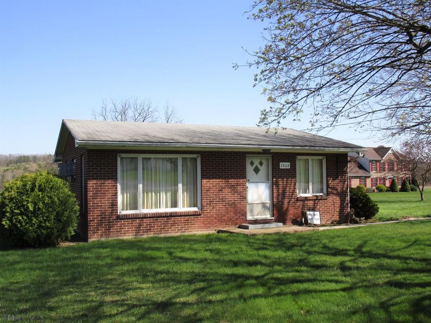 One-story brick salon originally designed & built by Paul Kauffman for future conversion to a 1-bedroom residence for the down-sizers! Has an eat-in kitchen, full bath & utility rm.  Super-nice, level lot with mun. water & sewer (Fishertown Water Auth.-currently $54 / qtr. minimum/Overage more ;  E. St. Clair Sewer - currently $34 / mo.) .  A pretty rural setting along Valley Road just south of the main Fishertown build-up.  Age, square feet, lot info are approximate - NO guarantee.   May be a sewer line right-of-way thru prop.  Survey available.   Being sold As-Is.