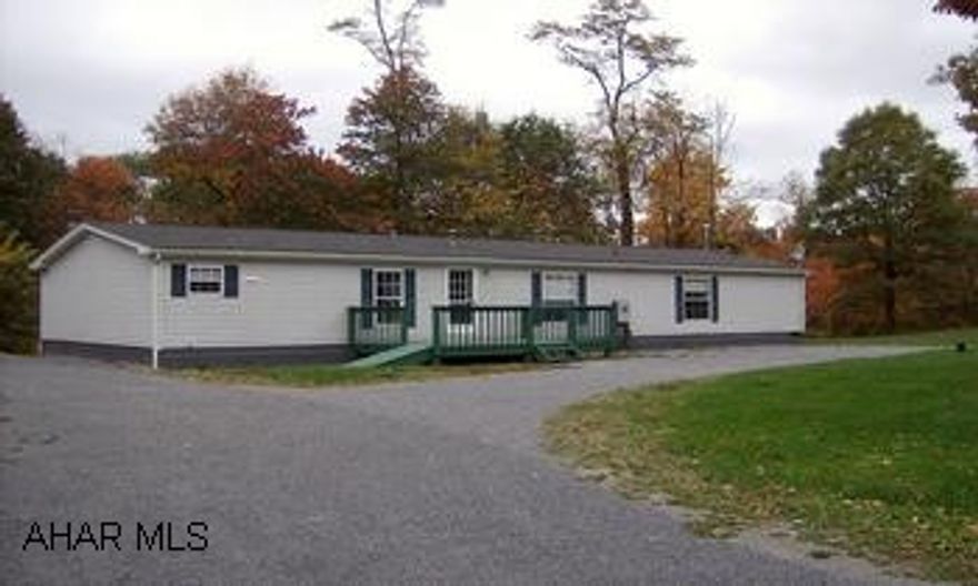 Property is a double wide mobile home situated in a lovely setting on 3.653 acres.  Property has front and rear deck and shed. Property is a double wide mobile home situated in a lovely setting on 3.653 acres.  Property has front and rear deck and shed.  Travelling on Piney Creek Road (866) towards Williamsburg, turn right on Royer Road and travel 1.3 miles, turn left onto Ridge Raod, go .6 miles, property on left.  Look for sign.