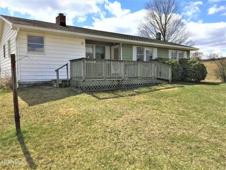 This Ranch is looking for someone to appreciate its beautiful views. Close to the Md. line , yet located in Pa.  Ranch home with 2 baths, full basement unfinished. A small cabin outside that could be used for guests. Also a carport and detached garage all on 4.39 acres. Call to tour property now.