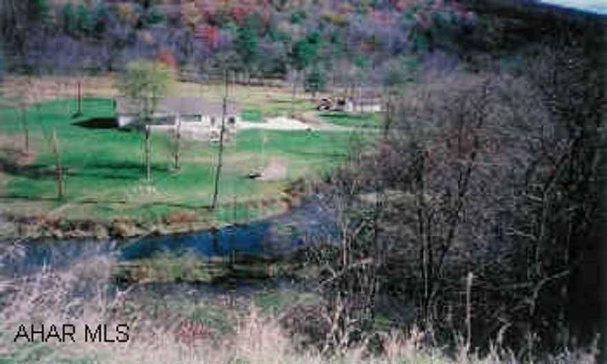 Beuatiful 3BR/2BA Ranch on 39.9 secluded acres w/over 3600' of trout stream front and adjoining State Game Lands. Also includes 3BR furnished cottage. State Game Lands, stream, fishing, secluded, Home Warranty.