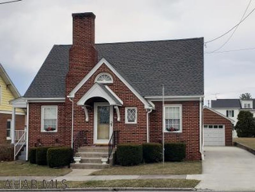 Beautiful 3-bedroom 1.5-bath brick home w/hardwood floors, fireplace, 1st-floor bedroom, formal dining room, 1-car detached garage, newer windows, roof, furnace & concrete drive. J-532