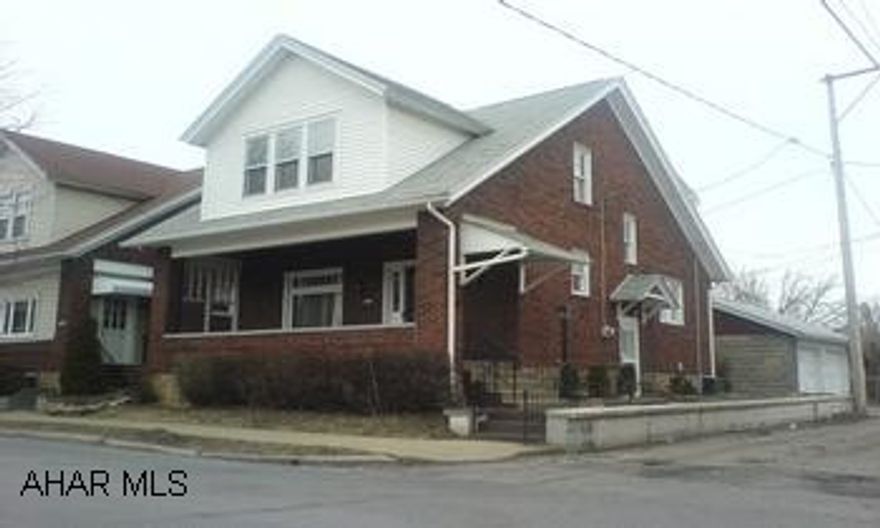 Great 3 bedroom brick home with updated interior, new carpet, fresh paint, white kitchen cabinets, fireplace, central air, and new thermo windows on 2nd floor.