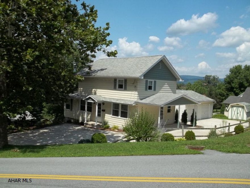 This is definitely a must see home.  Freshly painted inside and out, super-sized newer two car garage and shed, all new windows, lovely landscaping, 3 large bedrooms, 1.5 baths and lovely views.Yard goes beyond the concrete driveway to the hedge row behind and to the right of the house.