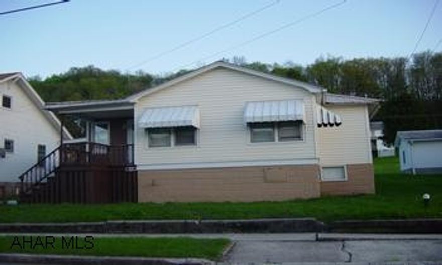 "As Is, Where Is"     Enclosed heated front porch