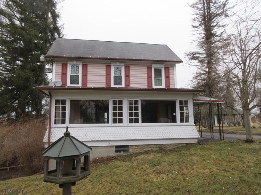 Philipsburg area 2 story vinyl home on 2 acres with eat-in kitchen with pantry, enclosed porch, formal dining room, formal living room, 3 bedrooms and bath. Nice over-sized 3 car detached garage, 1 car integral garage, and back yard gazebo. AS-IS sale. Seller will make no repairs.