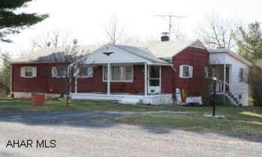 Ranch home offers private setting with country and woodland views. Alumium/cedar shake shingle exterior. Cozy fireplace in family room. Attached storage garage. Home Warranty Package Included.