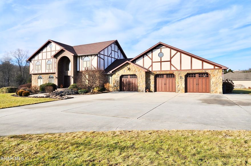 This wonderful and spectacular custom built 2 story, stucco, brick and stone home contains 4 bedrooms up, 3 1/2 bathrooms, oversized 3 car attached garage, heated inground pool, and lots of hardscape all on 2.63 acres. Located at the intersection of Route 220, Route 350, and near the on ramp to Interstate I99, you can be in State College, Altoona City, Huntingdon or Philipsburg Boroughs in a short period of time. Fish in Big Fill Run, your own freshwater trout stream which also feeds the freshwater pond. Swim in the heated L shaped in ground pool. This is a one of a kind property and one of a kind find. Don't wait. The photos are great but seeing this in person is even better!