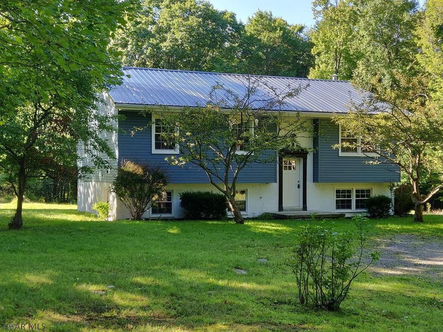 New! New! New! Practically Everything is New in this 4 BR 2 Bath Split Level Home. Roomy and Excellently Situated in a Great Spot on 1.13 acres near Indian Lake. Brand New Kitchen with Granite Countertops and New Kitchen Appliances. NEW: Doors/Windows, Siding, Soffit/Fascia, HVAC with Central Air, Flooring, Paint, Baths, Martin Water Treatment System... Lower Level Features a Spacious Master Suite with Full Bath, Den/Office, Laundry/Utility Room with Walkout Access. Main Level Delights with the Custom Kitchen Open to Dining Room Open to Living Room, 3 Bedrooms a Full Bath, and Back Deck. Level Yard Beautifully Surrounded by Trees with Circular Driveway. NO HOA and Low Taxes! Shanksville-Stonycreek School District. Home Does Not Disappoint! Just Move In!