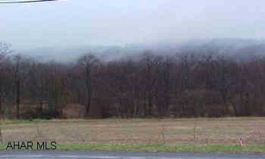 Nice building lot with mountain views. Perc approved for sand mound sewer system. Great  location.